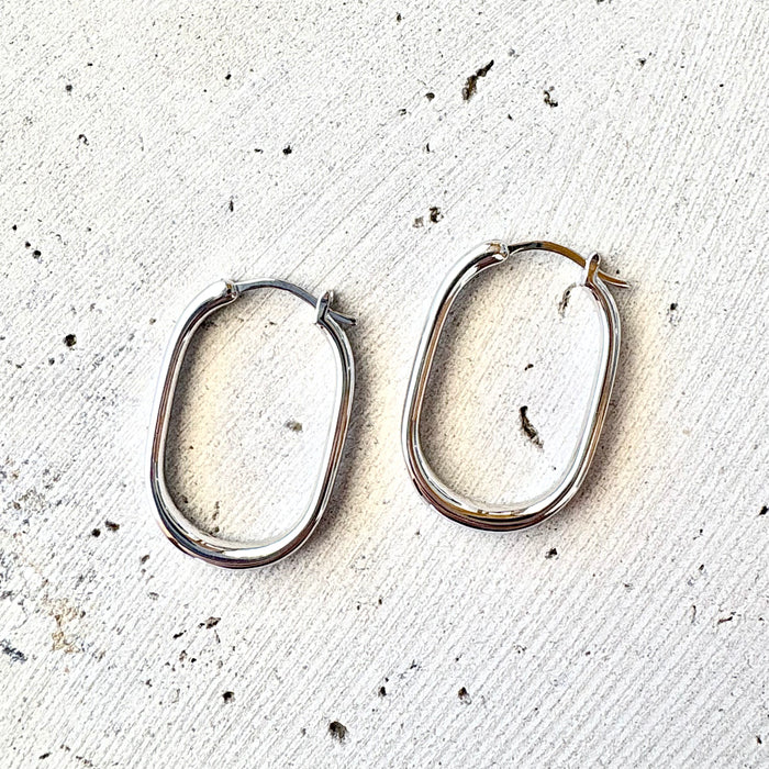Sterling silver oval hoop earrings with a beachy coastal design, Australian jewellery designed in Broome