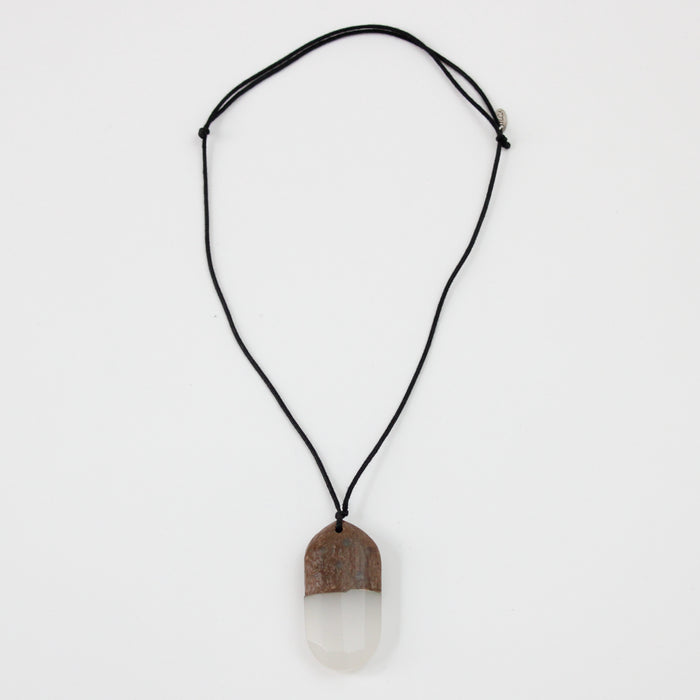 Adjustable geode inspired pendant necklace flat lay