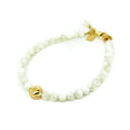 Beach Love Mother of Pearl Bracelet Gold featuring genuine mother of pearl beads, a polished gold heart charm, gold vermeil clasp, and adjustable chain.