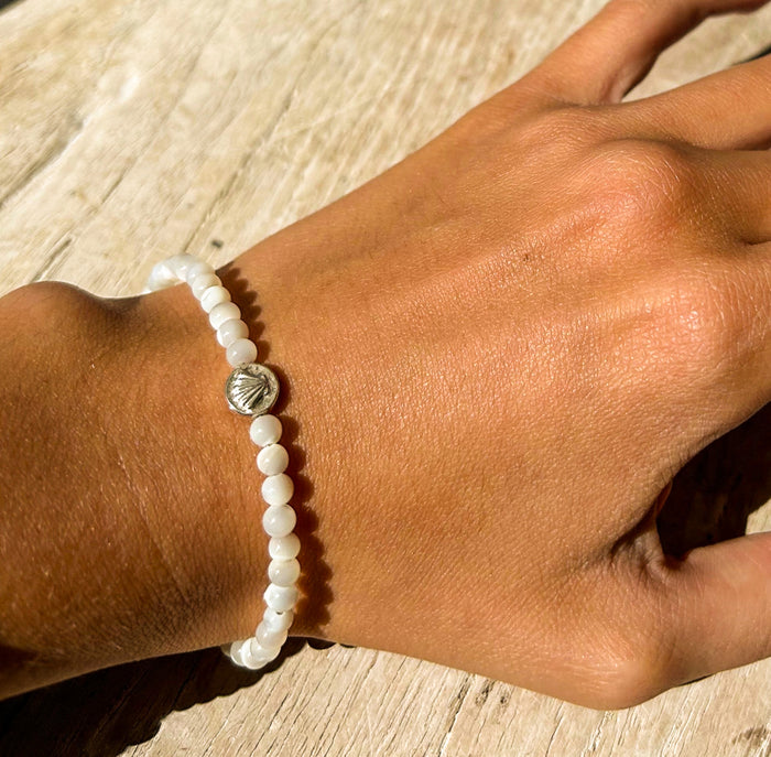 Mother of pearl beaded gemstone with two sided charm silver bracelet