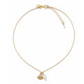 A delicate gold chain necklace featuring a small gold shell charm and a white pearl bead pendant, displayed on a clean white background.