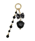Black Obsidian Cat Paw With Bowknot And Tassel Bag Charm