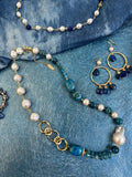Make a statement with this chic necklace that effortlessly blends sophistication and natural allure