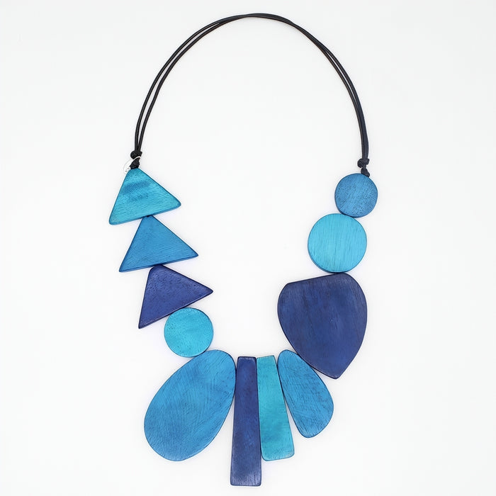 Necklace with blue geometric beads on a white background