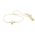 Boho Pearl Cream Tassel Bracelet featuring genuine freshwater pearls and cream tassel detail