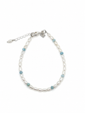 Boho Pearl Larimar Bracelet Silver featuring genuine freshwater seed pearls, soft blue larimar gemstones, sterling silver clasp, and adjustable chain.