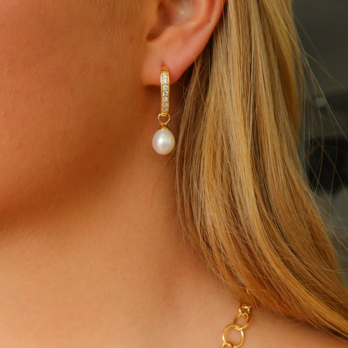 Elegant pearl drop earrings with cubic zirconia detail