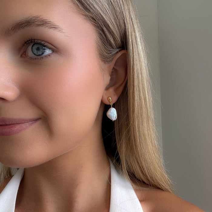 Baroque pearl earrings gold vermeil 15mm freshwater pearl studs worn model Australian jewellery