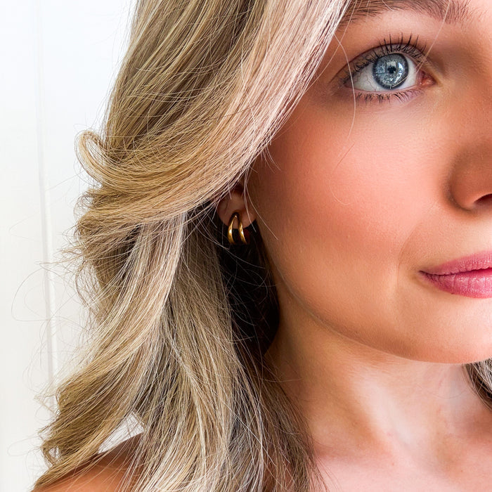 Gold vermeil coastal curl huggie earrings inspired by ocean waves and beachy Australian style