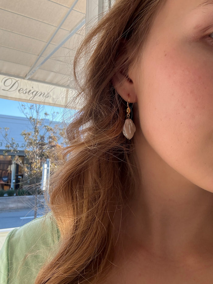 Coastal Dew Drop Baroque Pearl Hook Earrings in gold vermeil featuring genuine 15mm freshwater baroque pearls with natural organic shapes.
