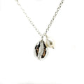 Cowrie Shell Pearl Necklace in 925 sterling silver featuring genuine freshwater pearls and a cowrie shell pendant