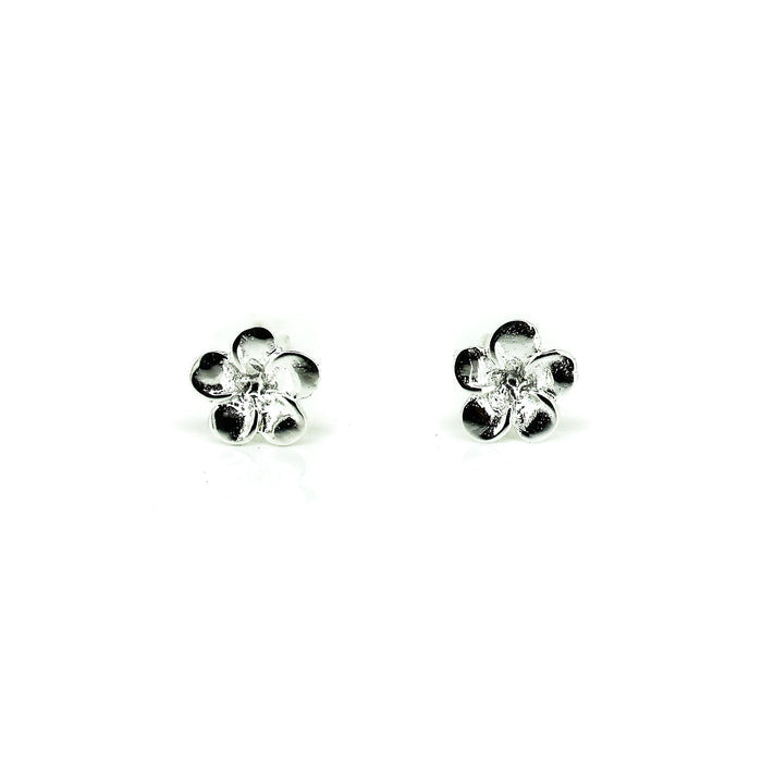 A pair of sterling silver frangipani stud earrings against a white background.