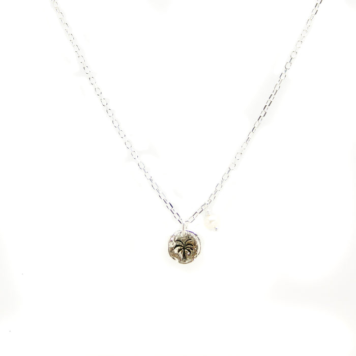 Dainty Palm Tree Necklace crafted in 925 sterling silver featuring a detailed palm tree pendant inspired by coastal Australia.