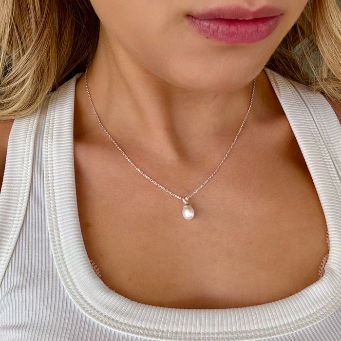 dainty white freshwater pearl on a silver chain