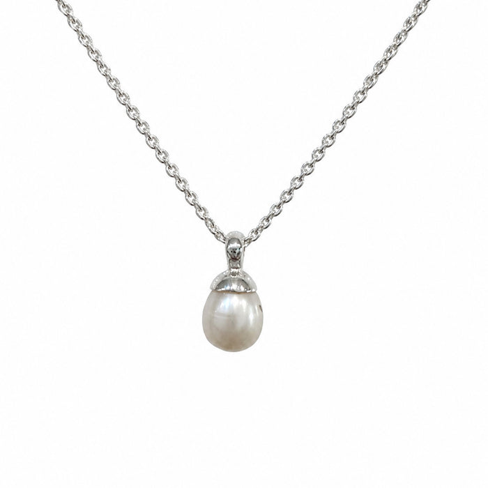 dainty white freshwater pearl on a dainty sterling silver chain