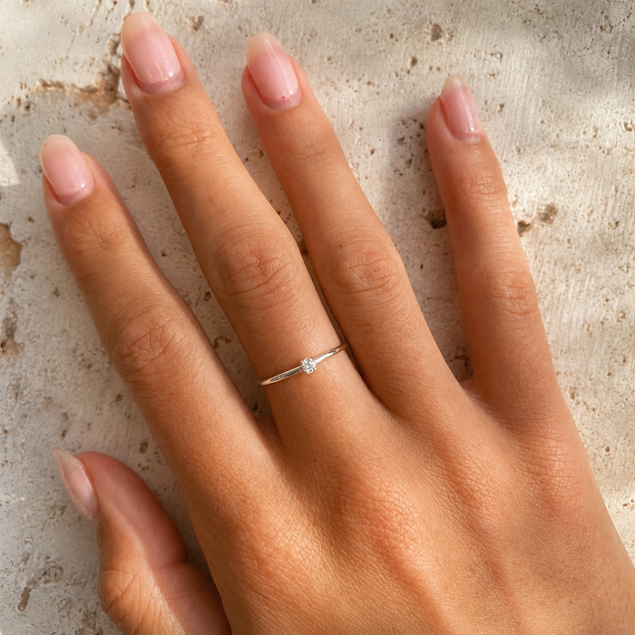 Dainty Zirconia Ring crafted in premium sterling silver featuring a sparkling cubic zirconia stone.