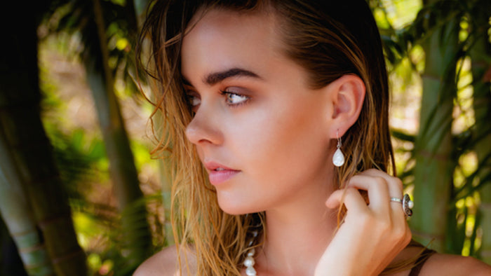 Mother of pearl dew drop shaped large hook silver earrings