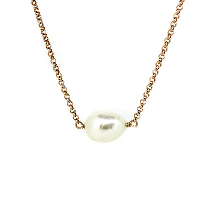 A rose gold vermeil chain necklace with a single Keshi pearl centerpiece.