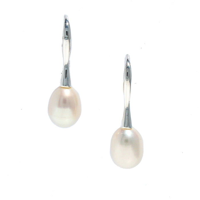A pair of white pearl earrings with a silver hook design.