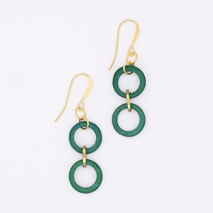 Green ring earrings with gold hooks on a white background