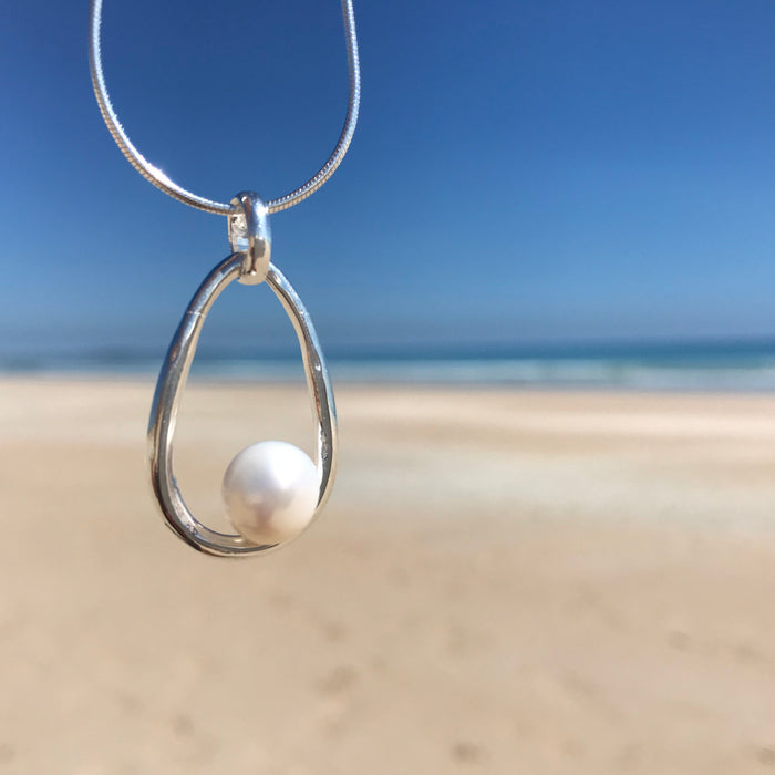 Endless Summer Pearl Pendant featuring a genuine freshwater pearl with coastal-inspired styling