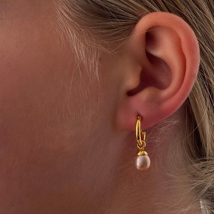 Eternal Summer Sunset pearl sleepers gold with peach freshwater pearls designed in Broome Western Australia