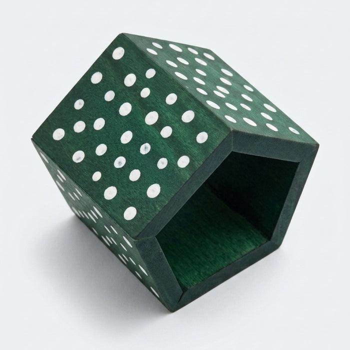Bold green wooden chunky bangle with white polka dots on a stretch cord. One size fits most — easy to stack or wear solo. Shop Sylca Designs.