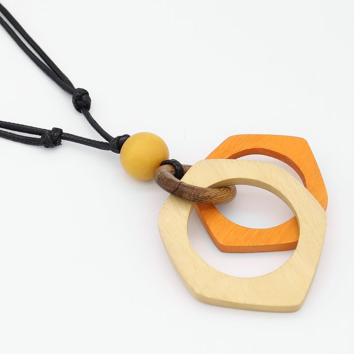 Necklace with geometric wooden pendants on a white background
