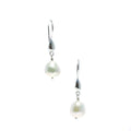 A pair of sterling silver hook earrings featuring Keshi pearl drops.