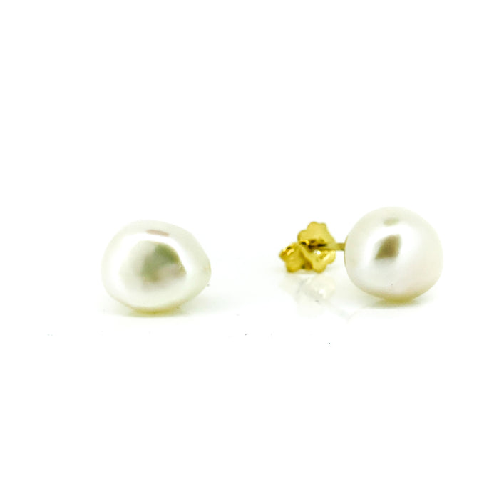 Pearl stud earrings with gold posts on a white background