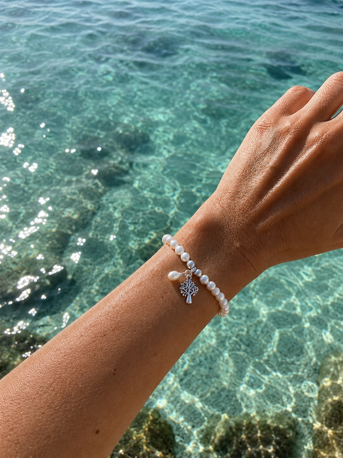 Kimberley Boab Pearl Stretch Bracelet with genuine freshwater pearls and sterling silver Boab tree charm inspired by the Kimberley region of Western Australia.
