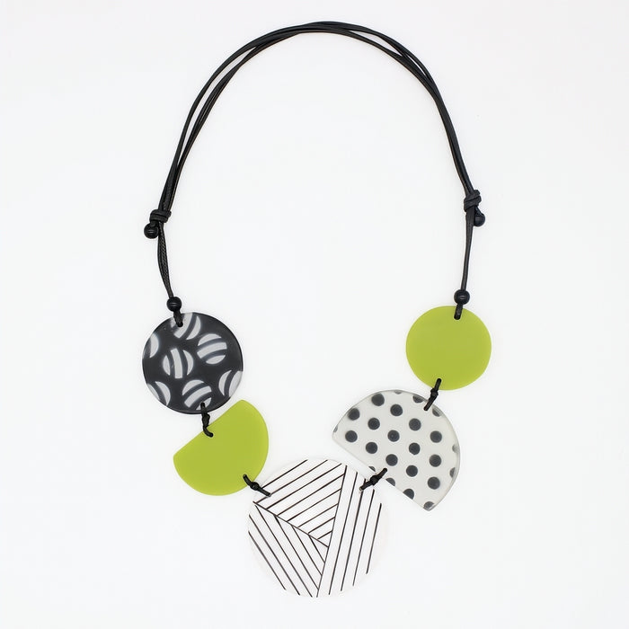 Necklace with geometric pendant on a white background