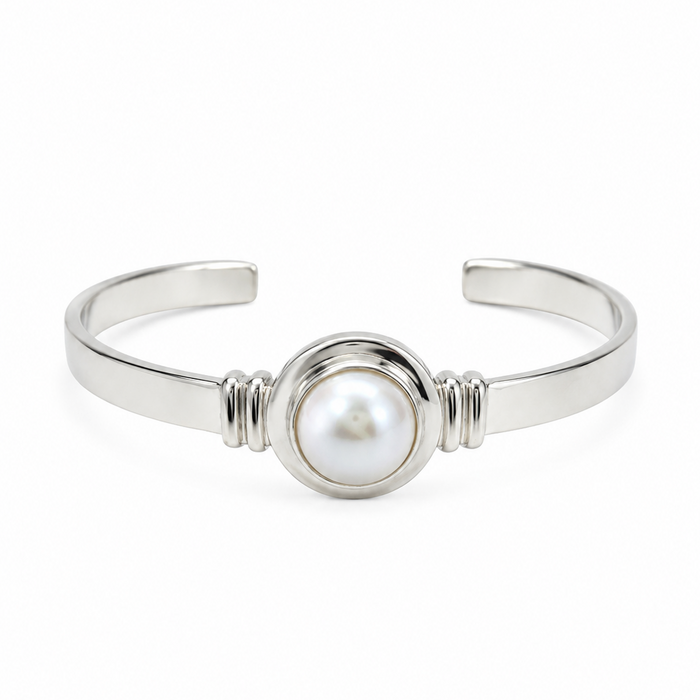 Adjustable sterling silver cuff bangle featuring a 12mm freshwater Mabe pearl, designed in Broome Western Australia with a coastal boho luxe style.