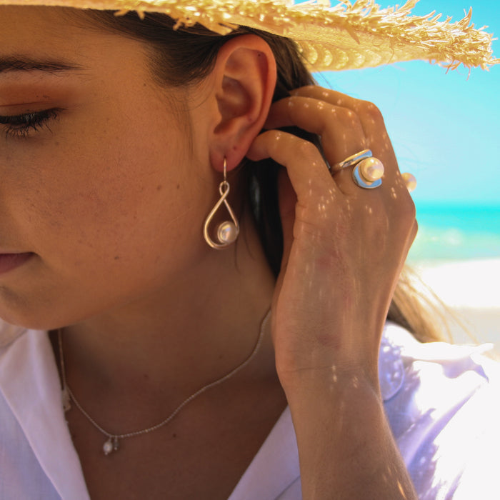 Moonlight Bay pearl hook earrings in 925 sterling silver with open teardrop frame designed in Broome Western Australia