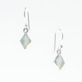 A pair of diamond-shaped mother of pearl earrings with shepherds hooks, set in hypo-allergenic sterling silver, on a white background.