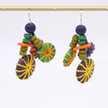 Colorful wood earrings on a white background