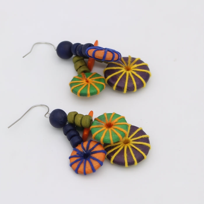 Colorful beaded earrings on a white background