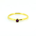 dainty gold ring with amethyst gemstone