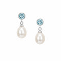 Ocean Blue Topaz Pearl Drop Studs in sterling silver with 6mm bezel-set blue topaz and 12mm white freshwater pearls