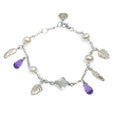 A bracelet featuring silver-colored beads, white pearls, purple amethyst drops, and metallic feather charms, with an adjustable clasp.