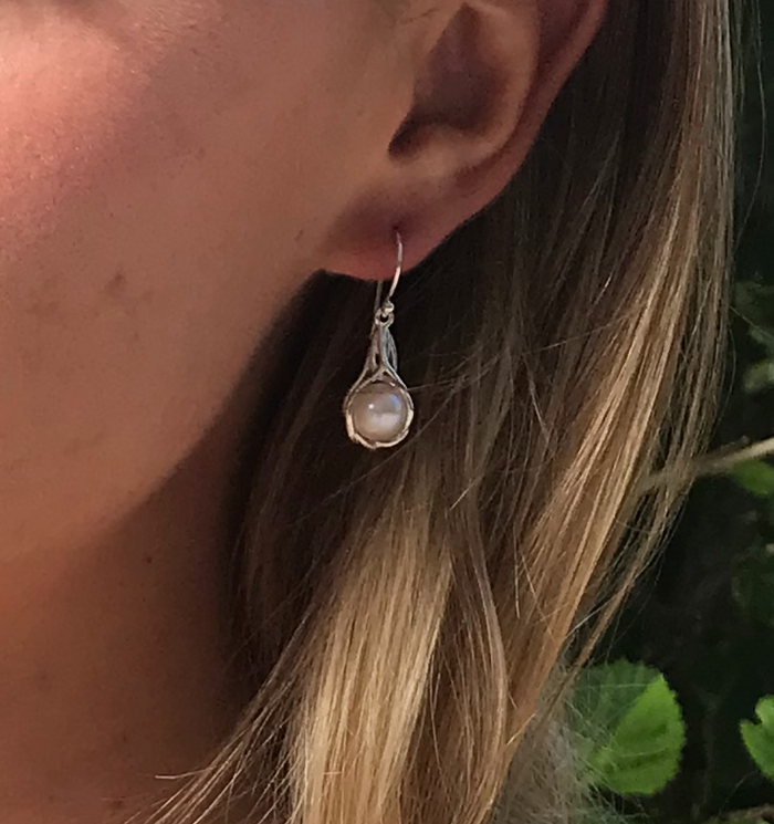 pearl hook earrings encased in silver
