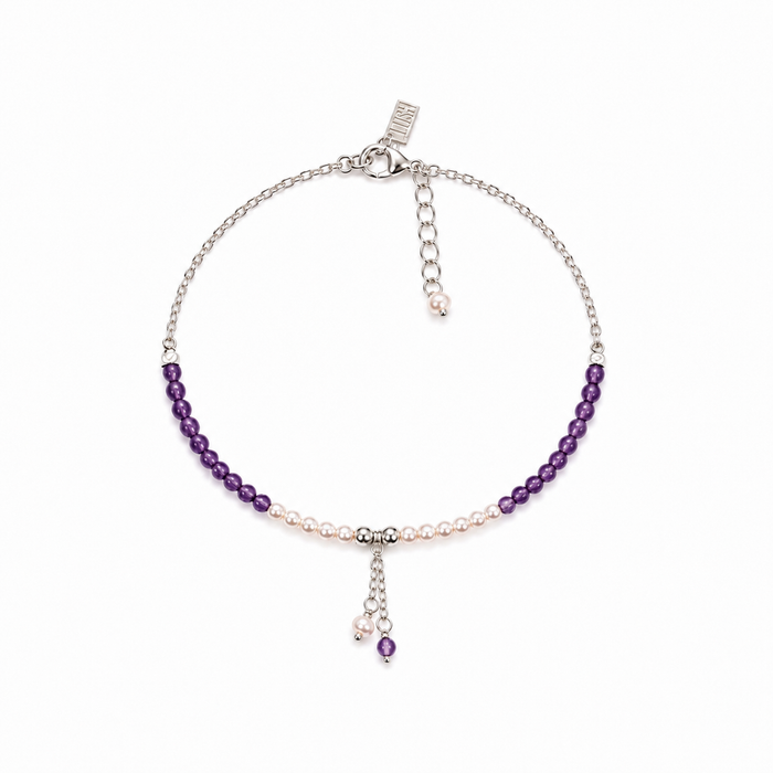 Ocean Spell Pearl Bracelet Amethyst featuring genuine amethyst gemstones, freshwater pearls and sterling silver accents on an adjustable bracelet.