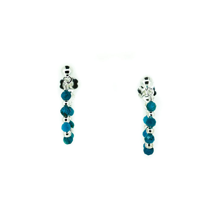 Pair of silver earrings with blue apatite beads with silver detailing on loop earrings