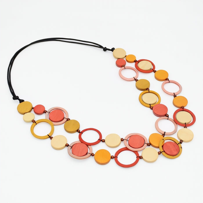Colorful necklace with circular beads on a white background