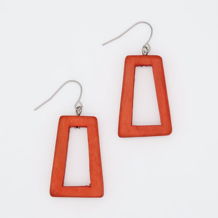 Red rectangular earrings on a white background