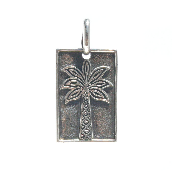 Sterling silver palm tree pendant necklace with Broome coordinates worn coastal Australian jewellery