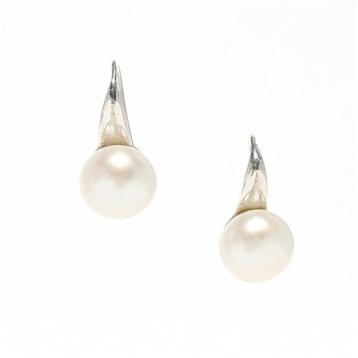 A pair of hook earrings featuring freshwater pearls attached to silver-colored bands.