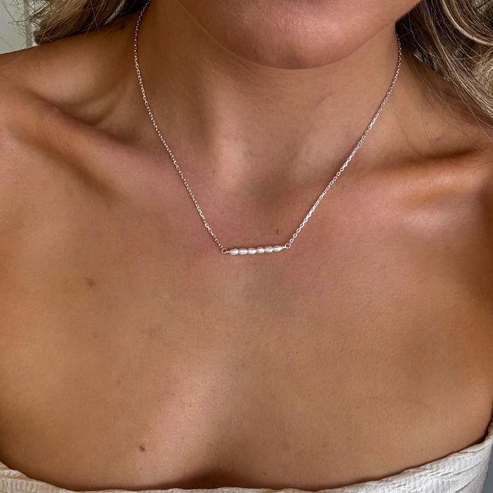dainty silver chain necklace with dainty pearls