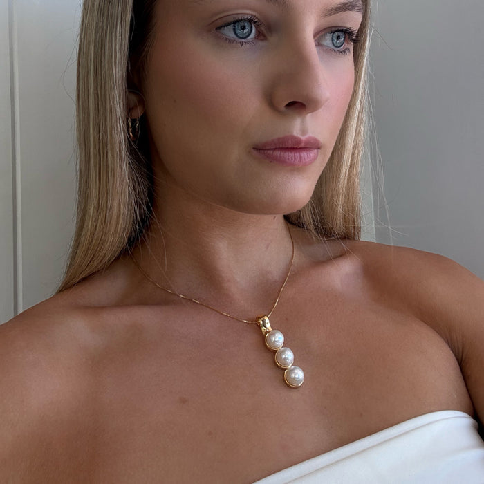 Pearl stack pendant featuring three freshwater pearls set in gold broome designed