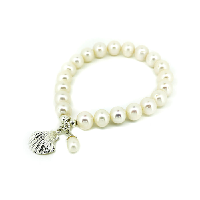 Pearl Stretch Bracelet with Shell Charm featuring luminous shell pearls and a sterling silver shell charm